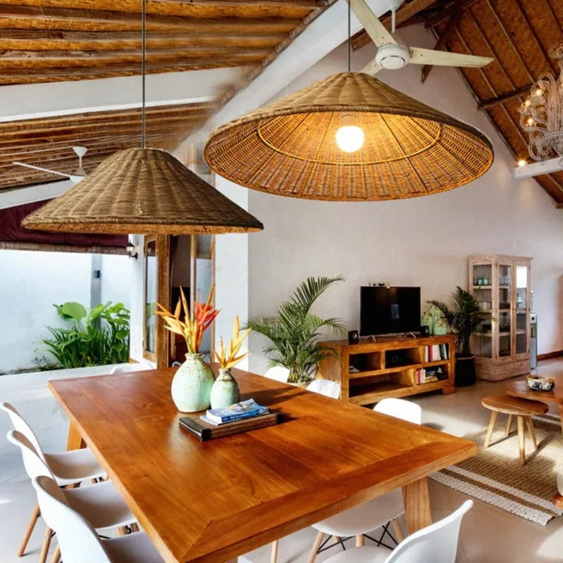Flared handwoven wicker hat lamp shade – shown lit in a room setting