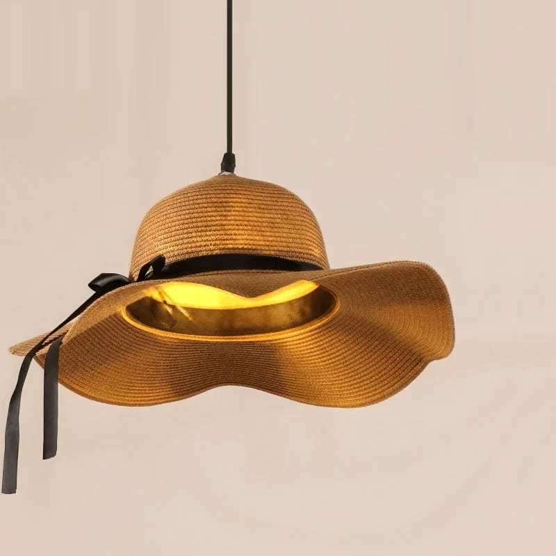 Handwoven natural beige rattan hat ceiling light – shown lit