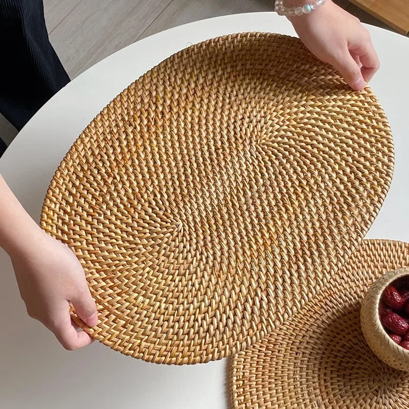 Round handwoven natural rattan trivet – shown in use (2)