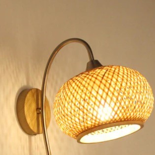 Handwoven rattan ball wall sconce – shown lit