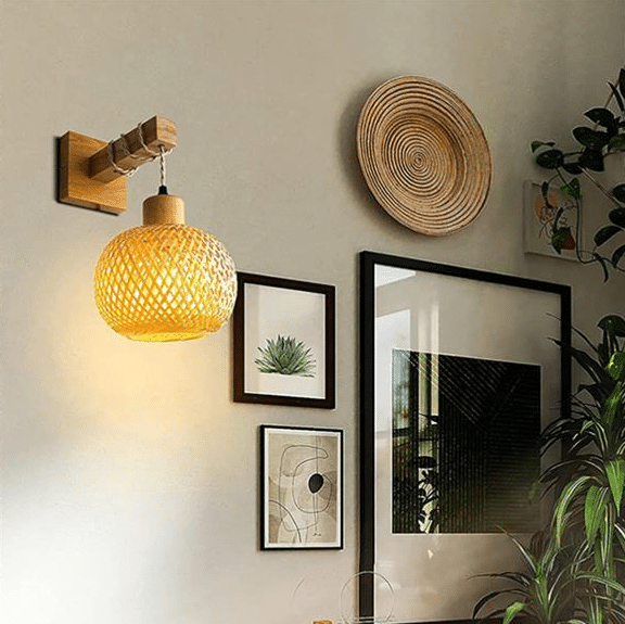Retro wall sconce with a wood frame and handwoven rattan shade – shown lit in a room setting