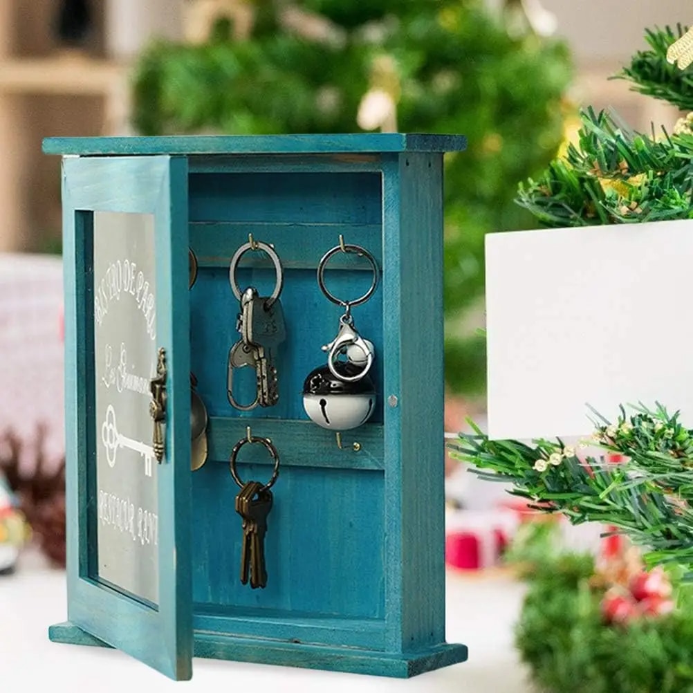 Retro wooden key box with a curved top and small hooks – shown in a room setting