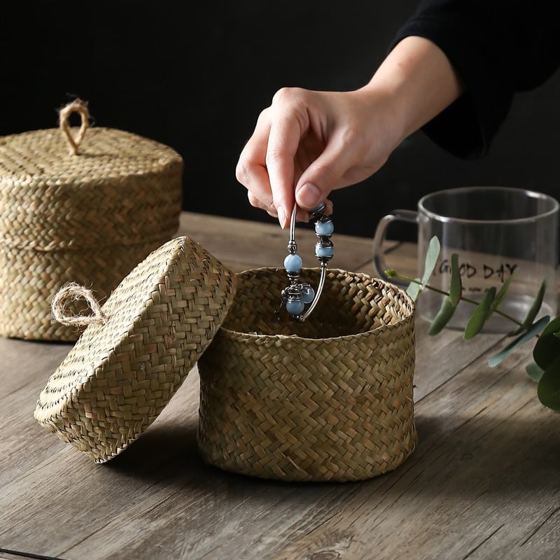 Stackable woven rattan storage box with a fitted lid – shown in use