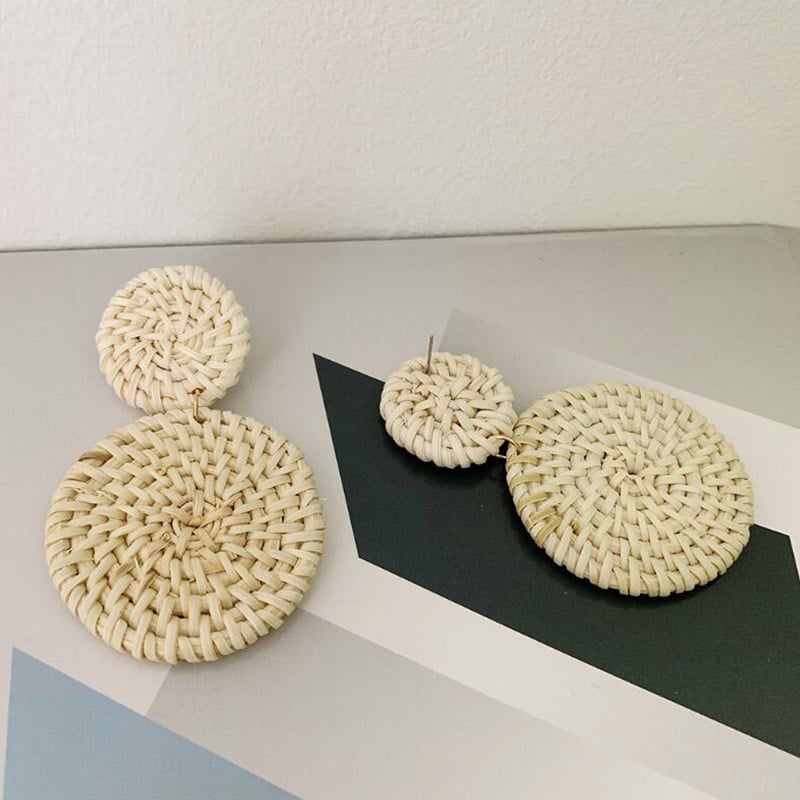 Round hand-braided rattan earrings – close-up detail