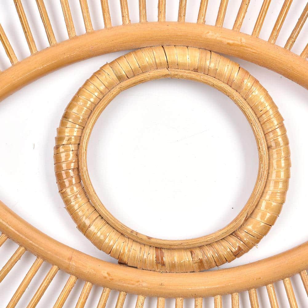 Eye-shaped rattan wall frame with a tight braid – close-up detail