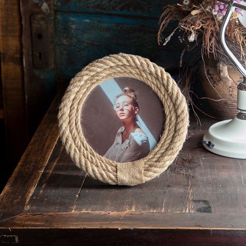 Round hemp and rattan photo frame – shown in a room setting