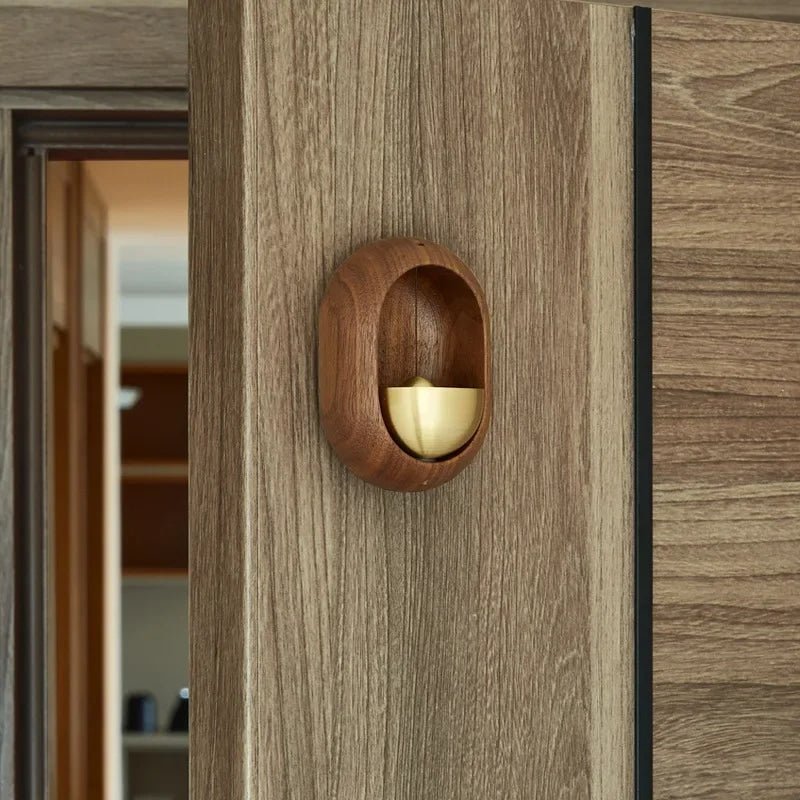 Modern bamboo wall chime with tubes at varied heights – shown in a room setting