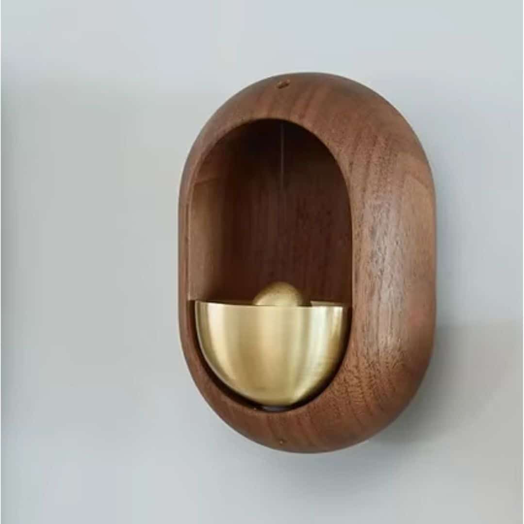 Modern bamboo wall chime with tubes at varied heights – close-up detail