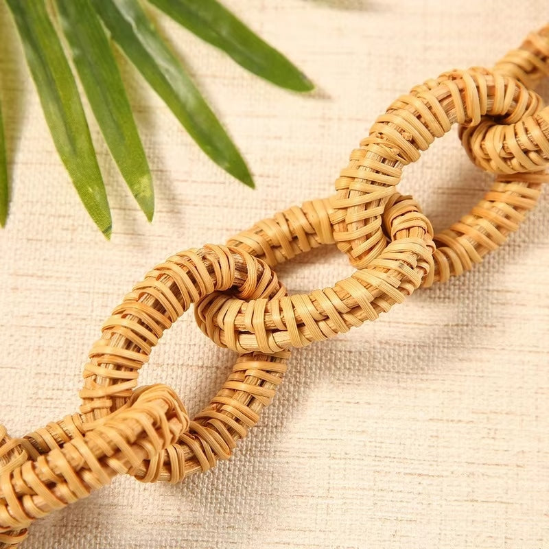 Decorative chain of large hand-braided rattan links – close-up detail