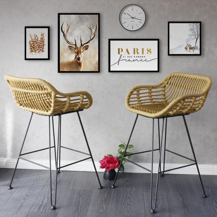 Modern rattan bar chair with a geometric openwork backrest – shown in a room setting