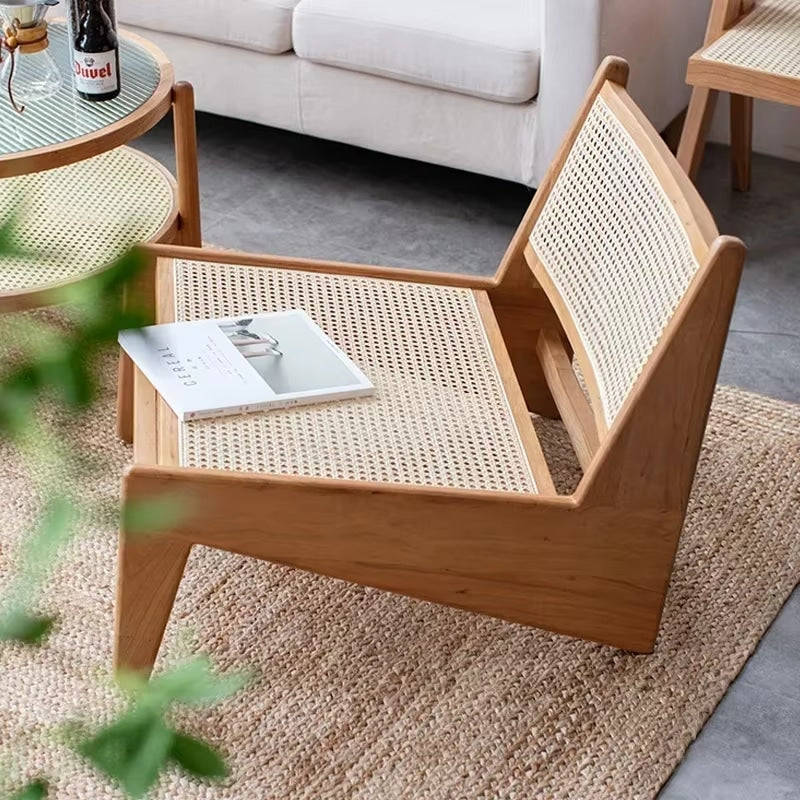 Low Nordic wicker chair with a generous seat – shown in a room setting (3)
