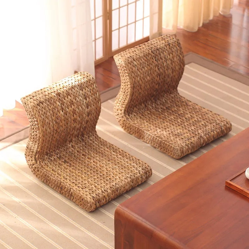 Legless curved wicker floor chair – shown in a room setting