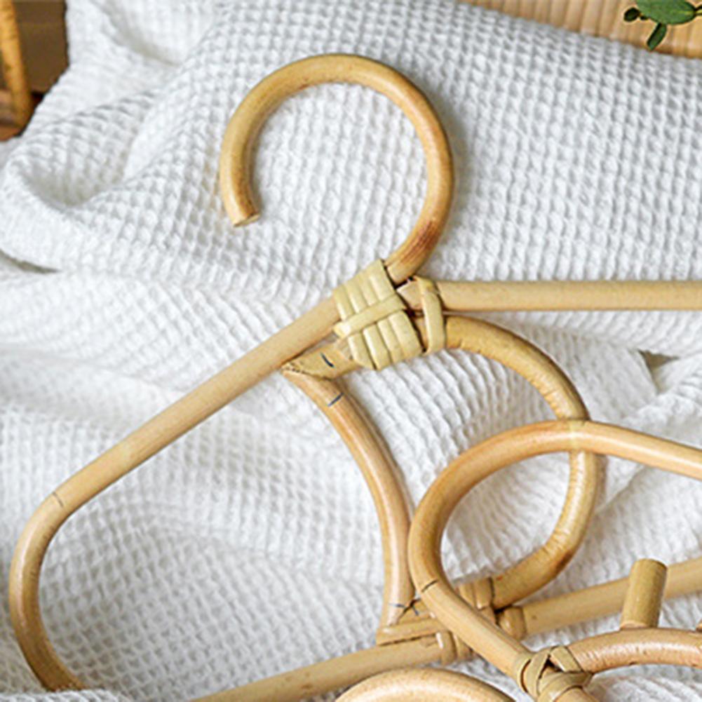 Crescent moon rattan kids hanger – close-up detail
