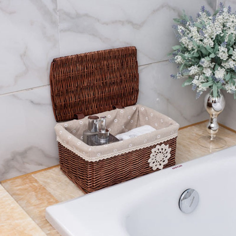 Lined rattan toy basket with lace trim – shown in a room setting
