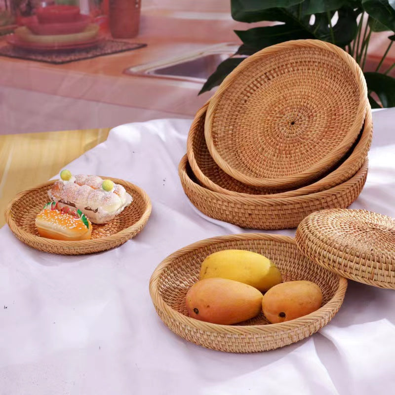 Handmade round rattan basket with a generous shape – shown in a room setting (4)