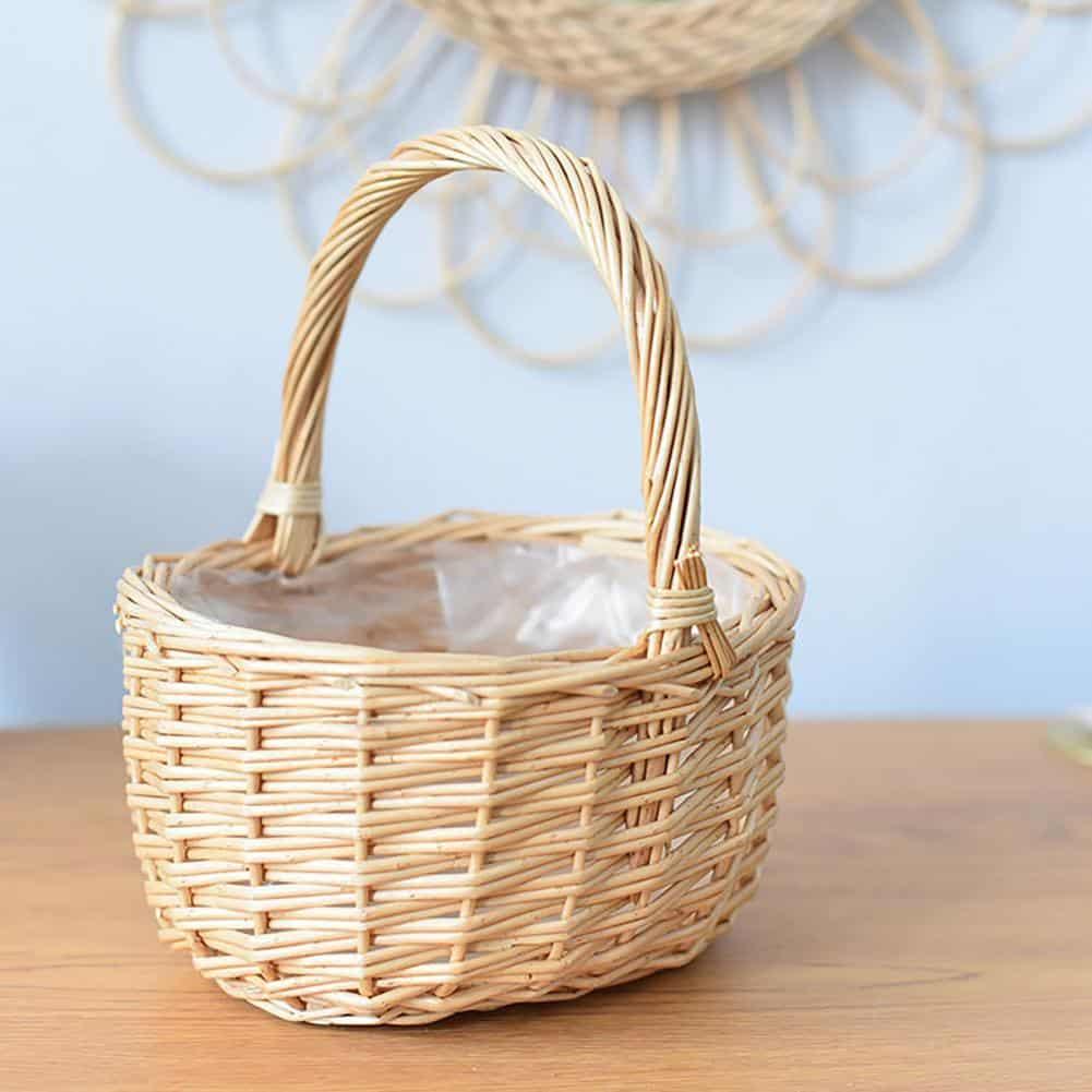 Beige round handwoven rattan basket with a sturdy handle – another view