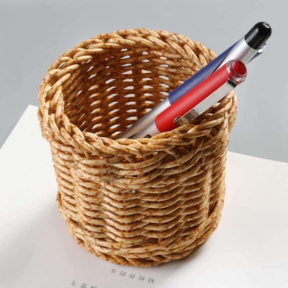 Small round handwoven rattan basket used as a pencil holder – another view