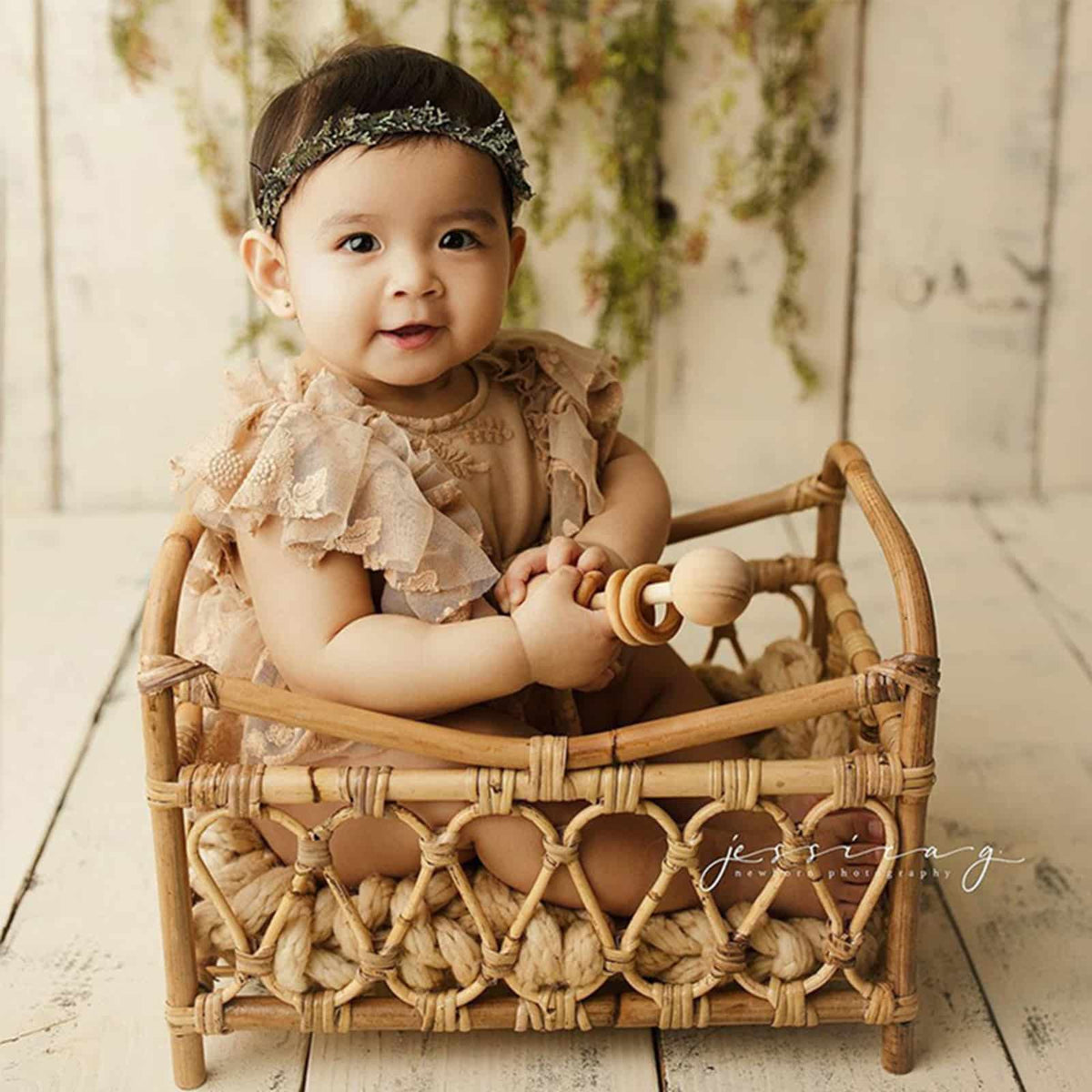 Openwork handwoven rattan moses basket – shown in use (2)