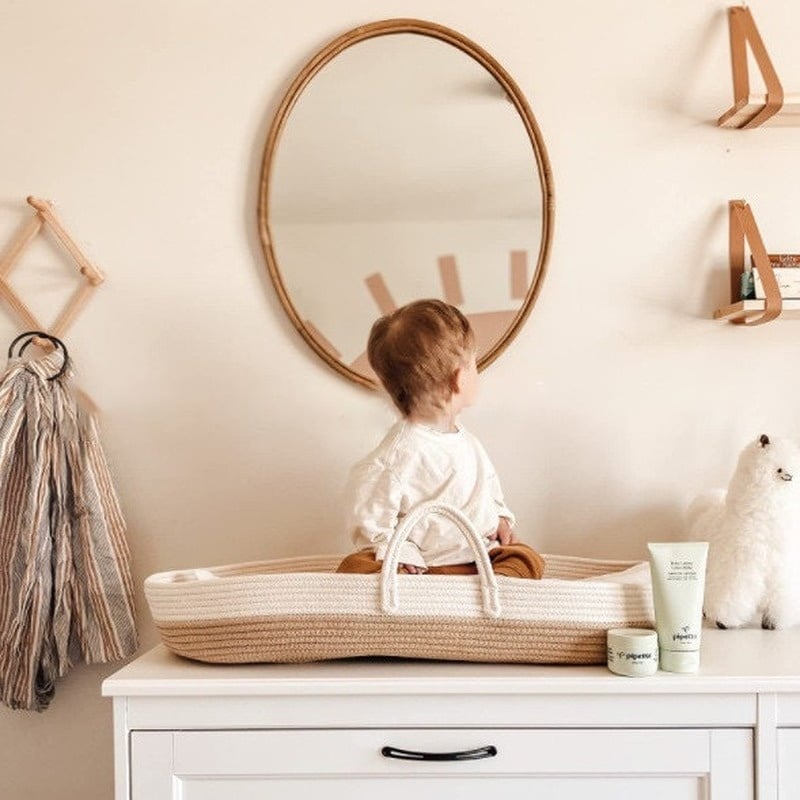 Two-tone synthetic rattan moses basket – shown in use