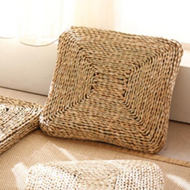 Dark square hand-braided rattan seat pad – shown in a room setting (3)
