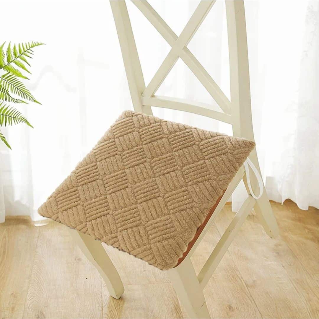 Thick round plush chair cushion with a rattan-look weave – shown in a room setting