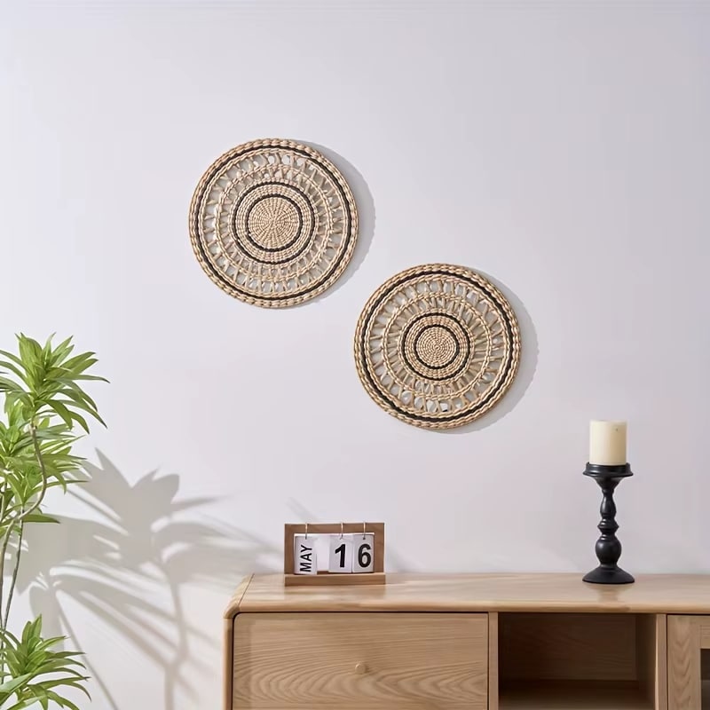 Boho round rattan wall decor with a slightly domed shape – shown in a room setting