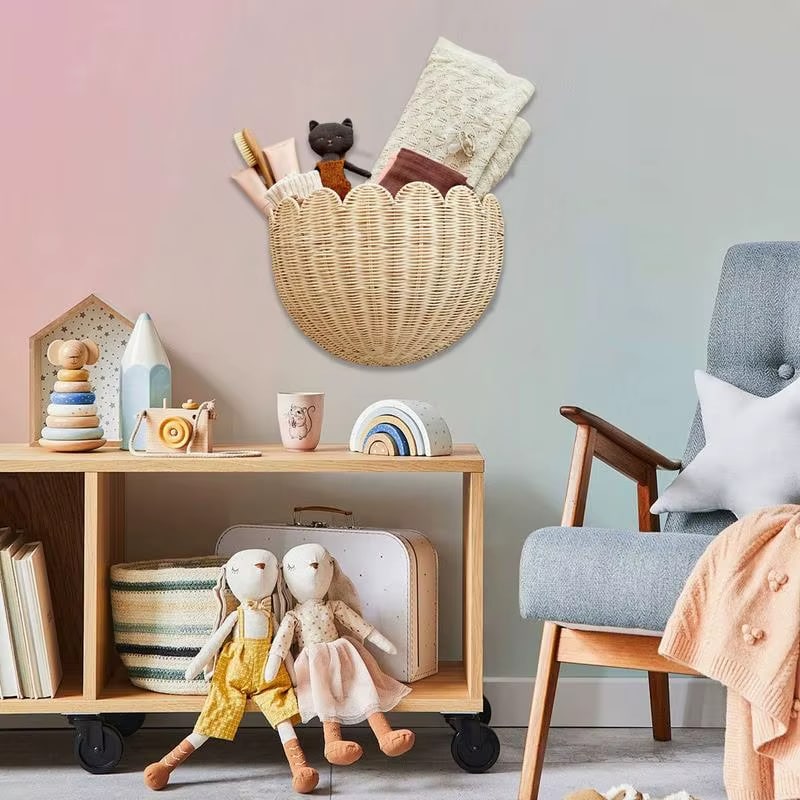 Handwoven round rattan wall basket with concentric circles – shown in a room setting (3)