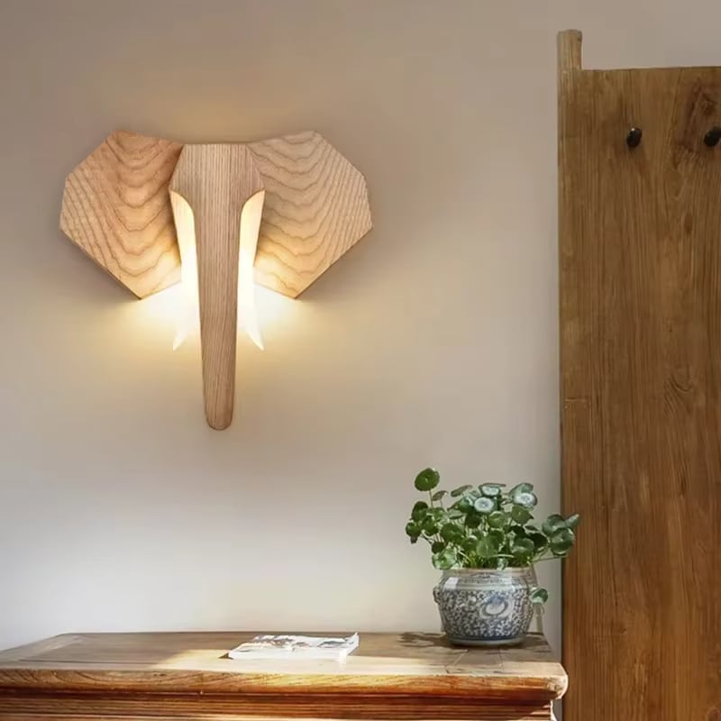 Carved wooden elephant head wall decor – shown in a room setting (2)