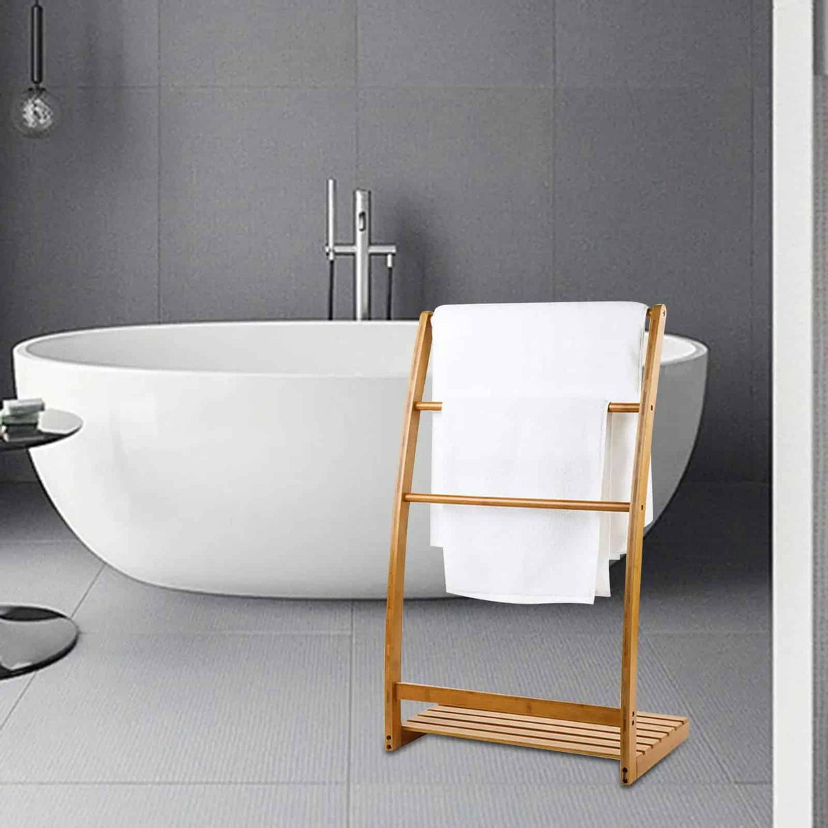 Slim bamboo towel ladder holding towels in a bathroom – shown in a room setting