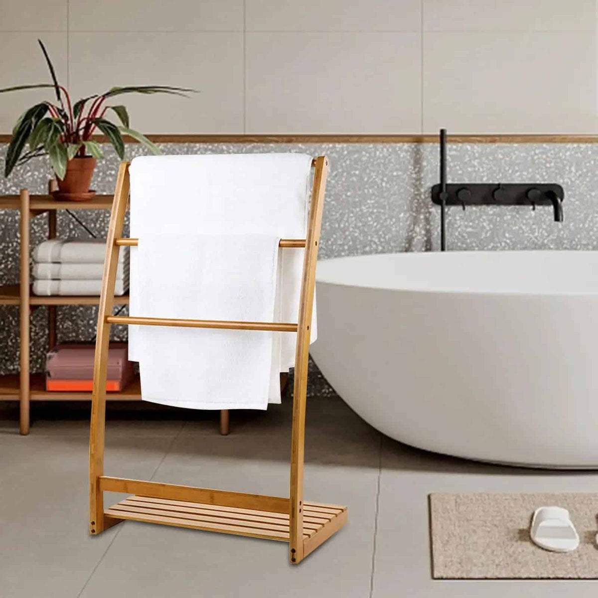 Slim bamboo towel ladder holding towels in a bathroom – shown in a room setting (3)