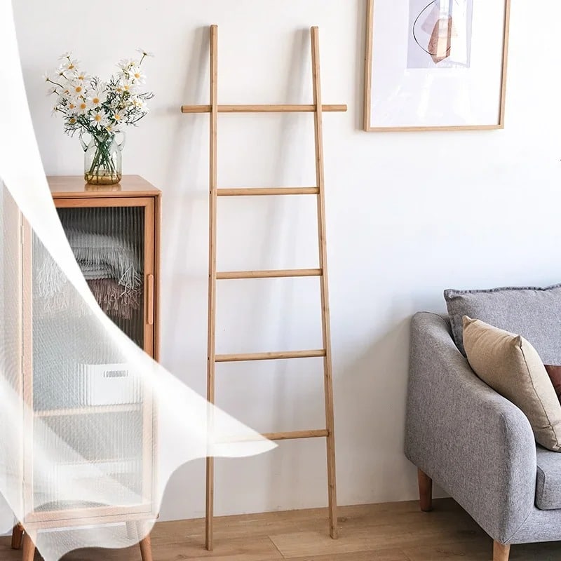 Hand-braided bamboo blanket ladder draped with a throw – shown in a room setting (3)