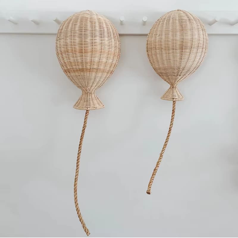 Set of two hand-braided rattan balloon wall decorations