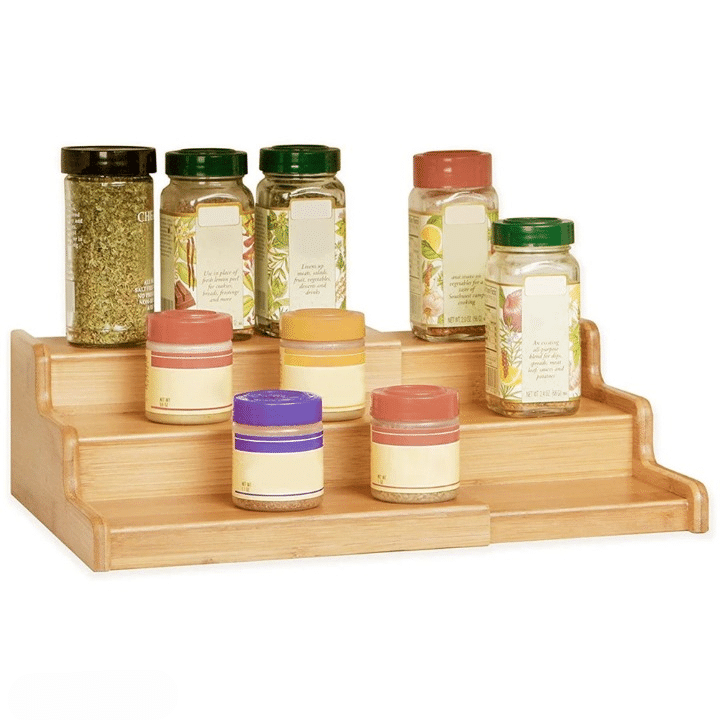 Expandable three-tier bamboo spice rack holding jars and bottles – another view