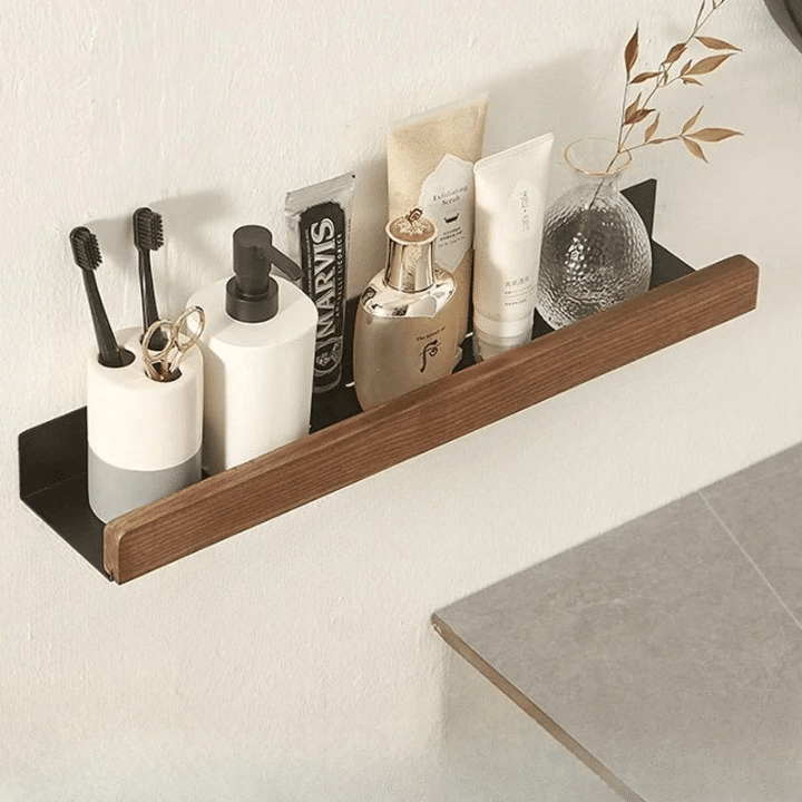 Floating natural wood shelf with a brushed aluminum support – shown in a room setting