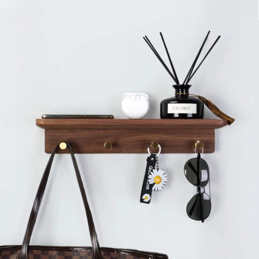 Wooden wall key holder shelf with hooks – shown in a room setting