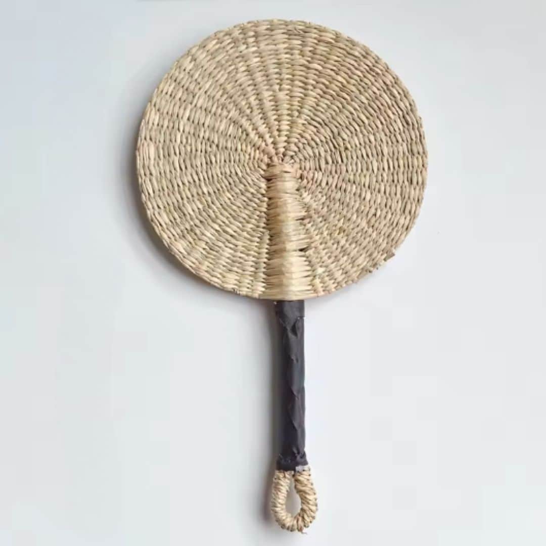 Decorative Nordic rattan fan with an open half-circle shape – beige variant, another view
