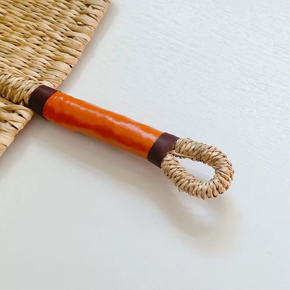 Nordic half-moon rattan fan with a contrasting handle – close-up detail