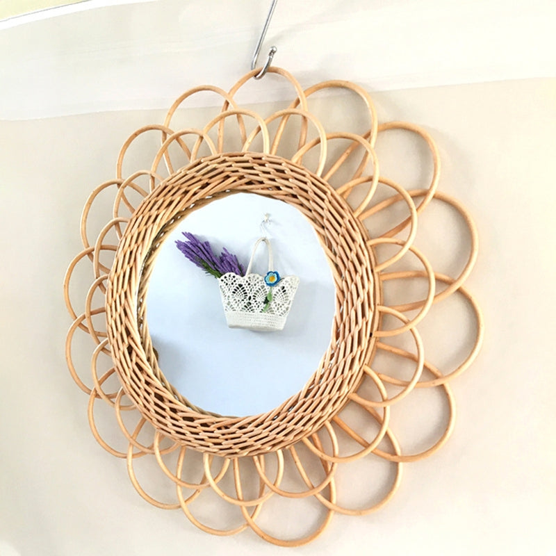 Large beige hand-braided rattan flower mirror – shown in a room setting
