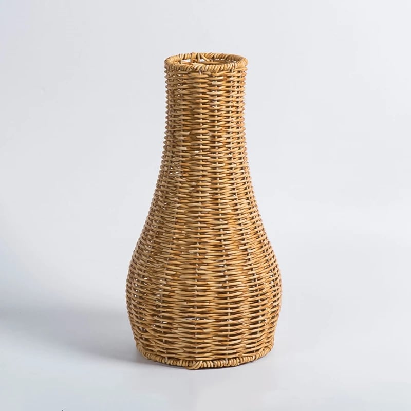 Large rustic wicker vase with a slightly flared neck