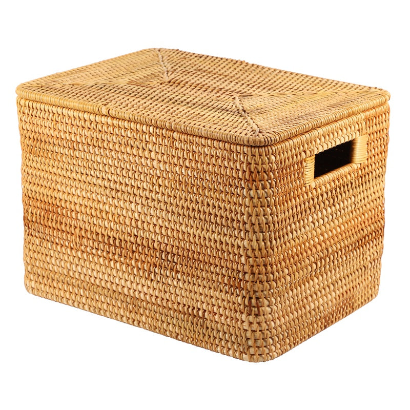 Large woven rattan trunk with side handles and a removable lid