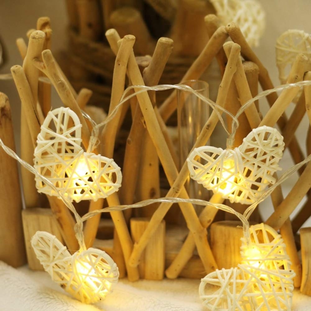 Battery-operated handwoven rattan heart light – shown lit