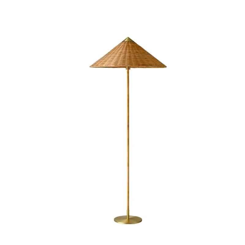 Pastoral rattan floor lamp with a large hat-shaped shade and golden base