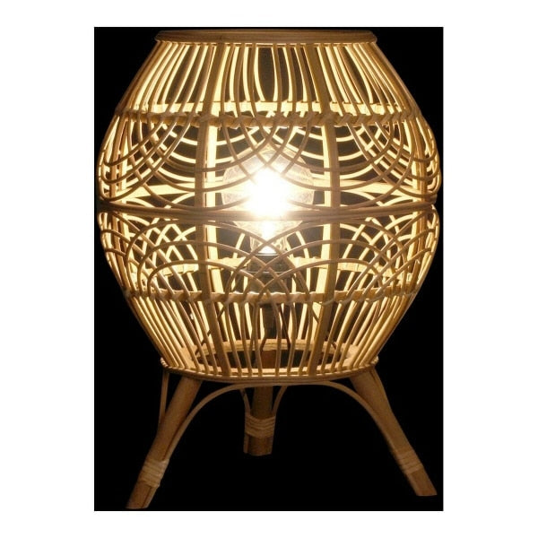 Handwoven bamboo table lamp with a natural paper shade – shown lit