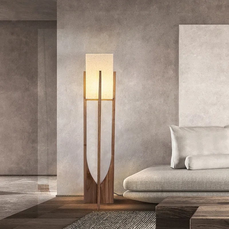 Modern wood table lamp with a handwoven shade – shown in a room setting (2)