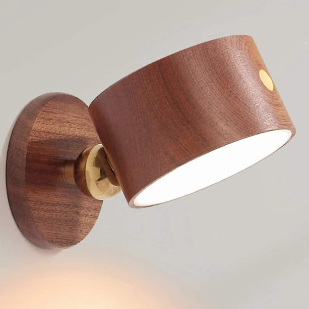 Wood swing-arm bedside wall lamp – brown variant, shown lit