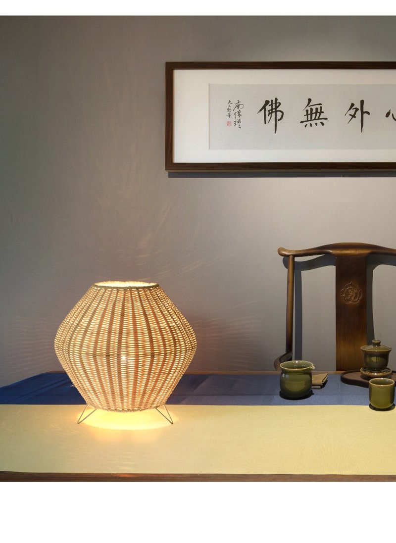 Handwoven tapered natural bamboo table lamp – shown in a room setting (2)