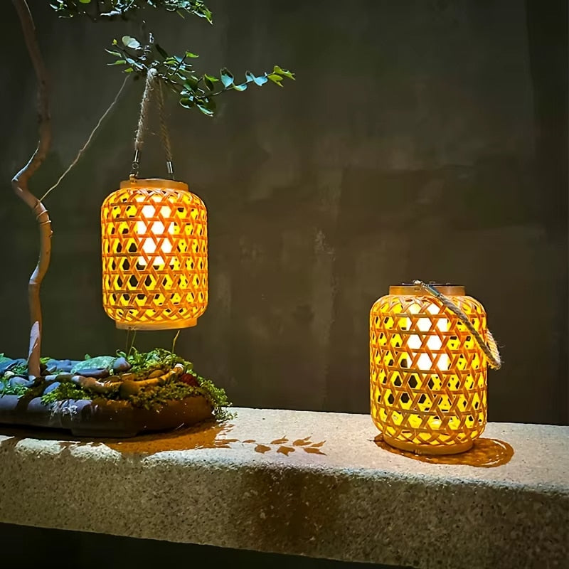 Woven hemp rope solar lantern – shown lit outdoors