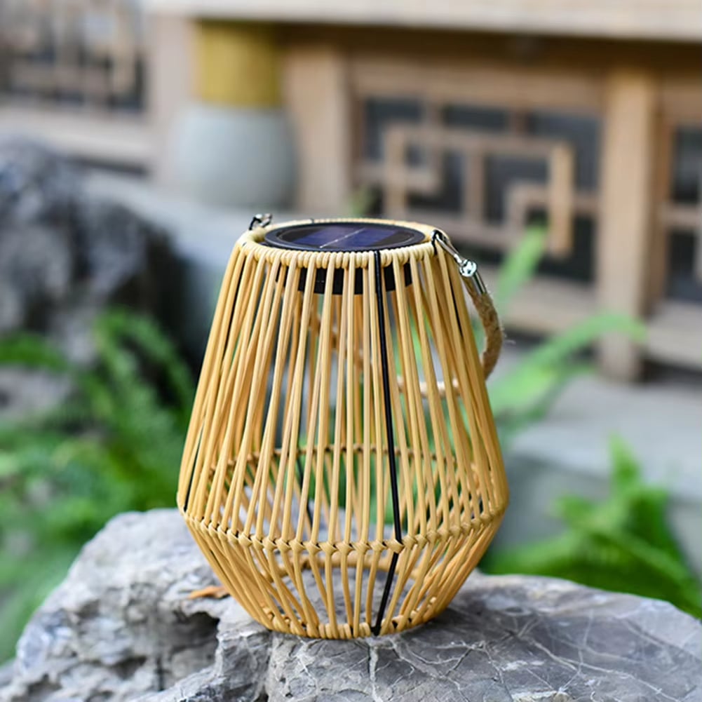 Waterproof solar rattan lantern in natural beige – shown outdoors
