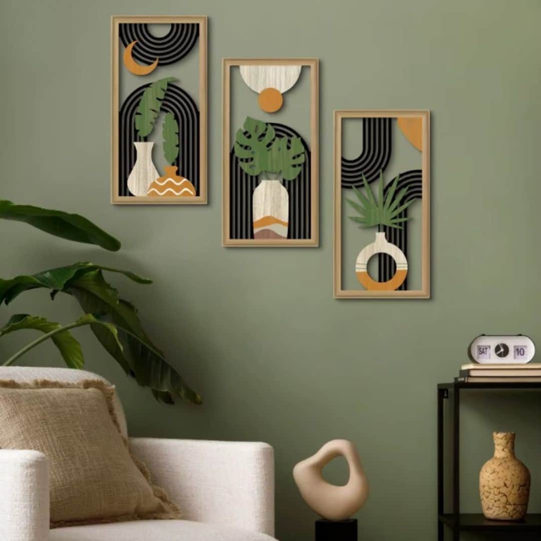 Set of three wooden art wall decorations in warm tones – shown in a room setting