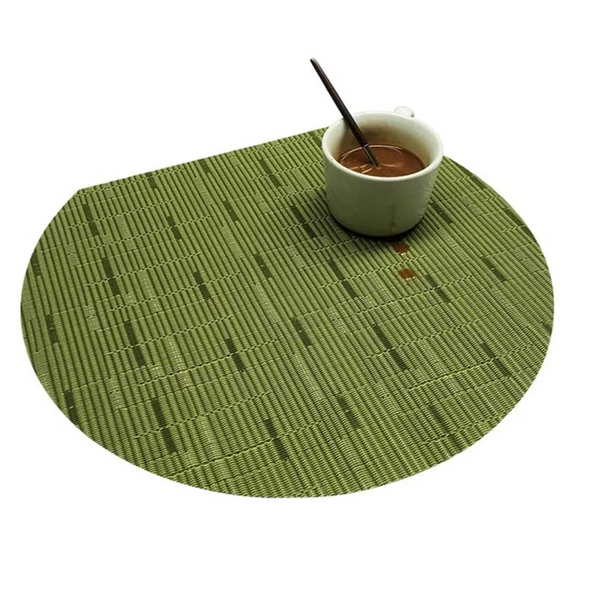 Set of four green woven bamboo placemats